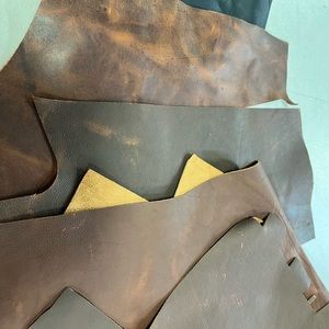 Brown leather scrap sizes range from small-medium great quality